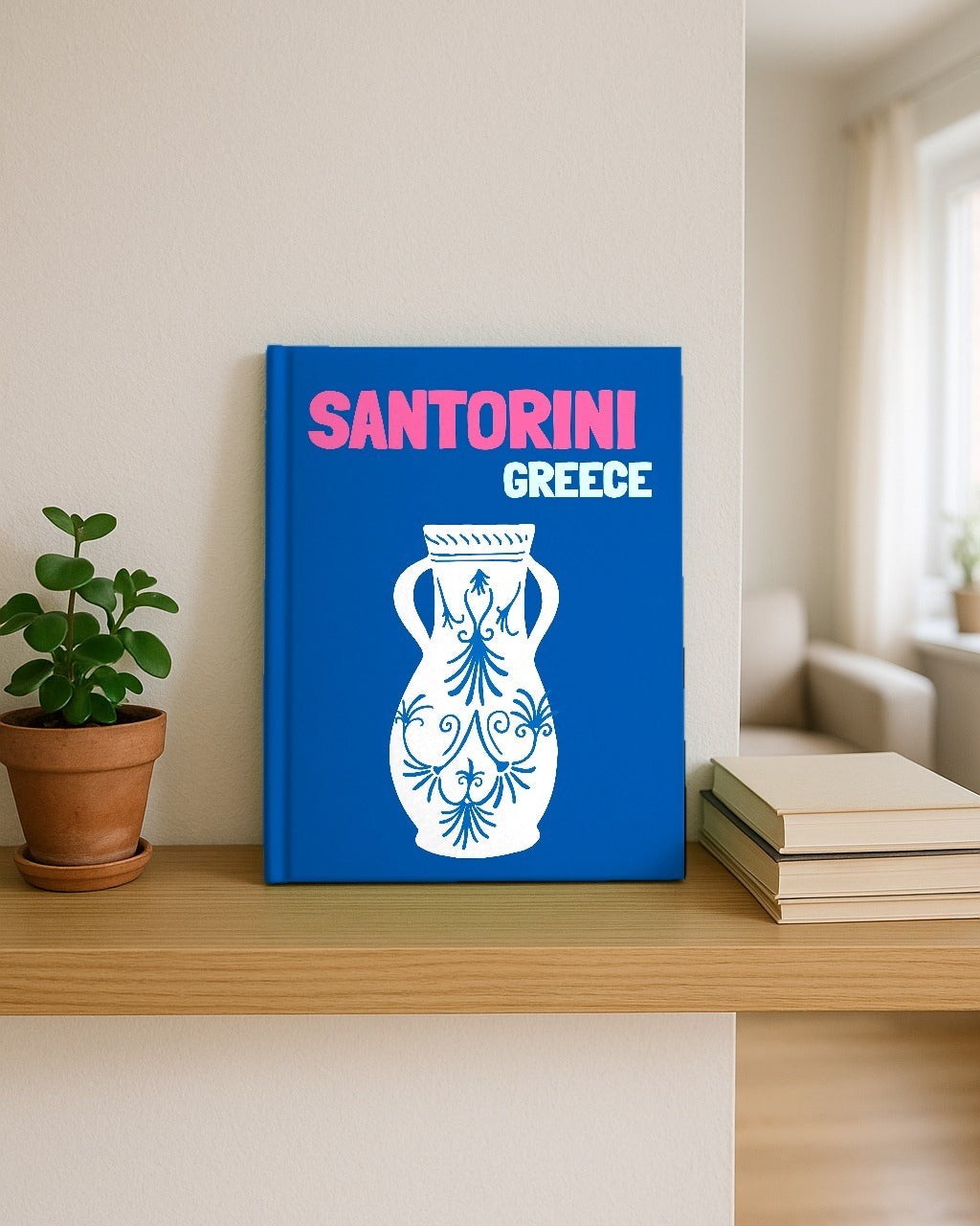 Album photo Santorin posé sur une étagère